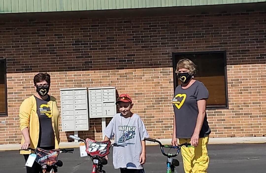 Post Photo for Boy donates 3 new bikes